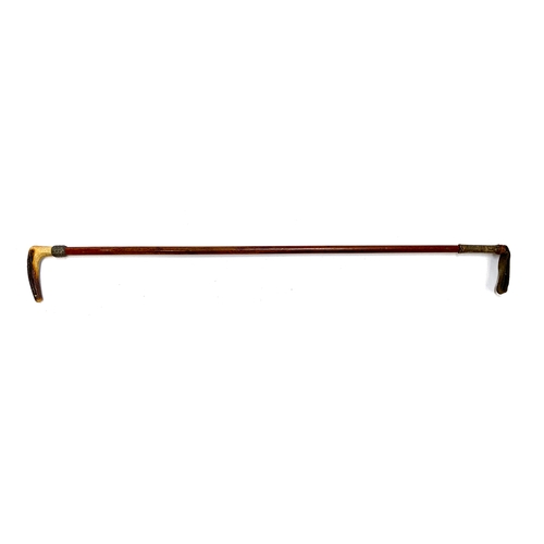 15 - A lady's hunting whip, with white metal collar and antler handle, 62cmL