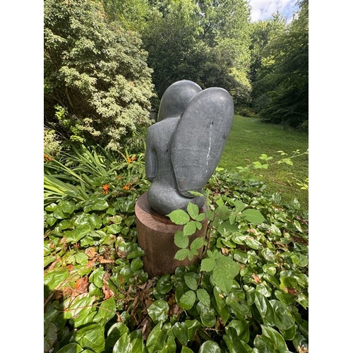 19 - Shona stone sculpture with circular metal plynth, artist unknown