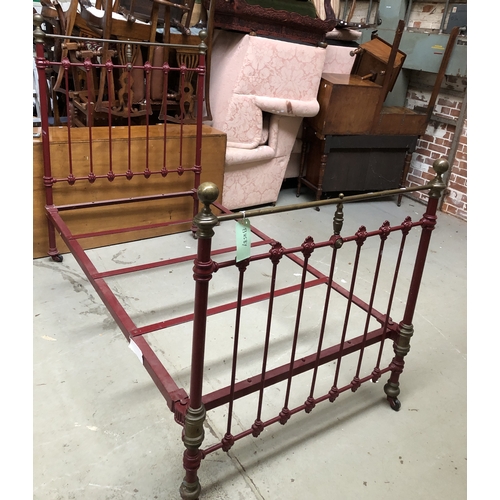 1751 - A good pair of brass, iron, and red painted single beds