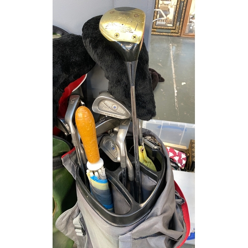 1753 - A full set of Ping blue dot golf clubs, in bag; together with a further set of lady's clubs