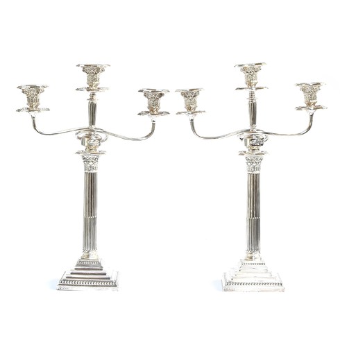 100 - A pair of large loaded silver candlesticks in Neoclassical style, by Hawksworth, Eyre & Co Ltd, Shef... 