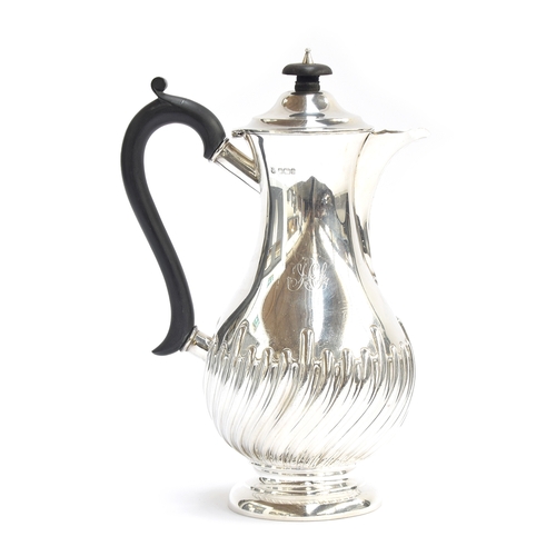 59 - An Edwardian silver coffee pot by James Deakin & Sons, Sheffield 1902, half gadrooned body, on a cir... 