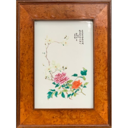 217 - A set of four Chinese famille rose porcelain plaques, each painted depicting magnolias, chrysanthemu... 