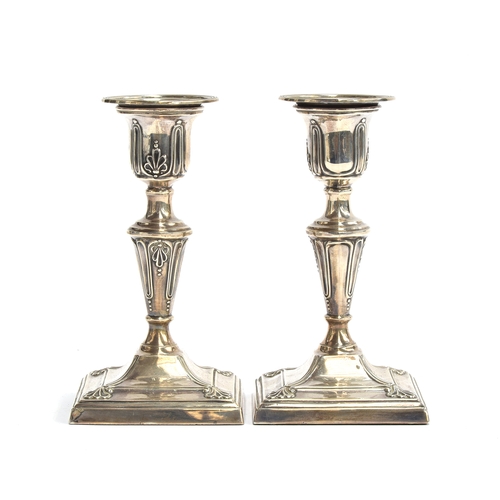 101 - A pair of late Victorian loaded silver candlesticks by George Wish and Jenkins & Timm, Sheffield 189... 