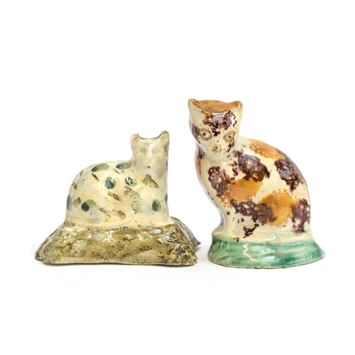 163 - Two 18th/early 19th century Staffordshire Creamware figures of cats, one painted in green spots and ... 