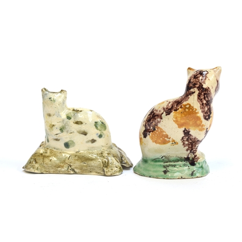 163 - Two 18th/early 19th century Staffordshire Creamware figures of cats, one painted in green spots and ... 