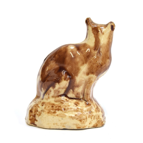 164 - An 18th century Staffordshire Whieldon type glazed figure of a seated cat, 6.5cm high