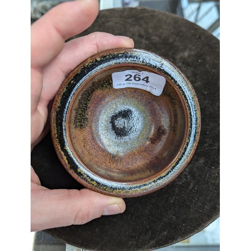 294 - A studio pottery bowl with lip, marked RB to base, 10.4cmD, together with three further studio potte... 