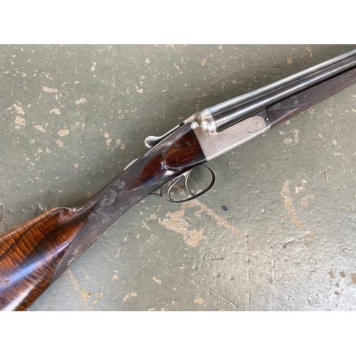 569 - A Webley & Scott 12 bore side by side ejector shotgun, number 93516, 30in barrels, in a canvas and s... 