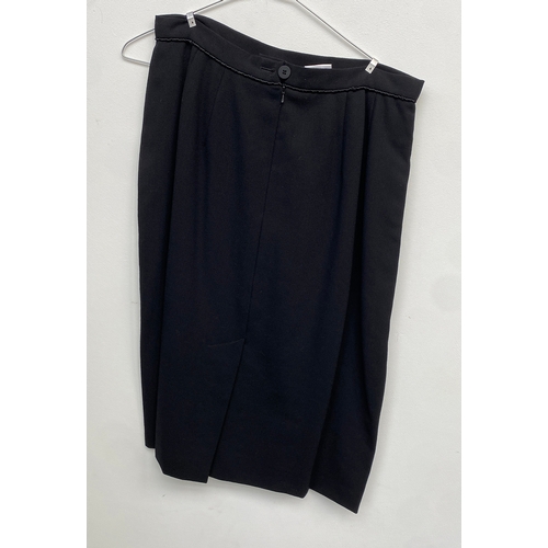 686 - A Jaeger black wool two piece skirt suit, UK size 16; together with a Jaeger blue size 44 two piece ... 