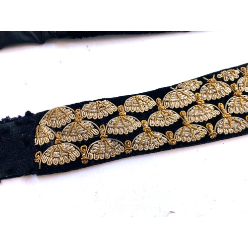 710 - Two Indian 1920s Zardozi metal thread embroidered velvet waistbands, 89cm long and 83cm long