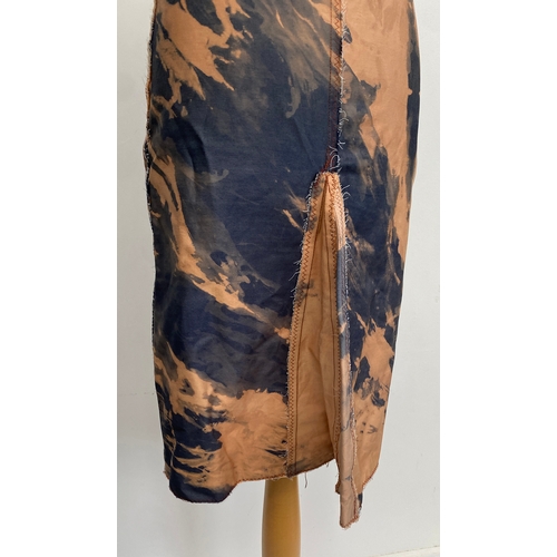 714 - A Julius Jethro of London 1960s skirt, with side fastening, size S

Provenance: from the wardrobe of... 