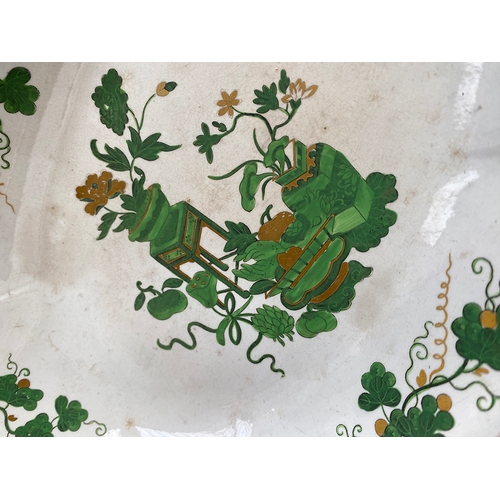 353 - An early 19th century Spode part dinner service, c.1815, Chinese precious objects and vines in green... 