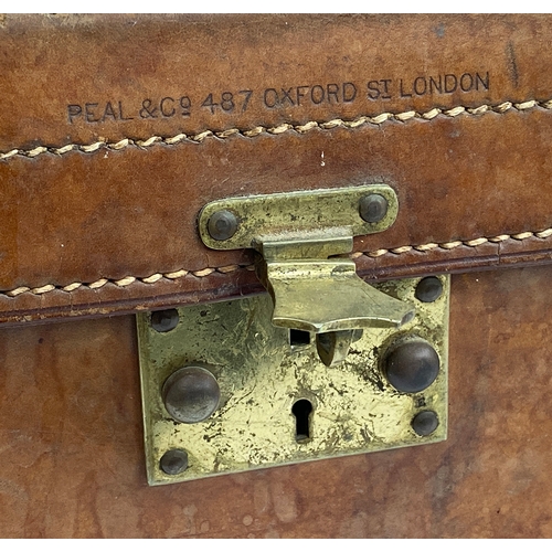 446 - A leather cartridge box, in as found condition, by Peal & Co, 487 Oxford Street, London, 36cmW