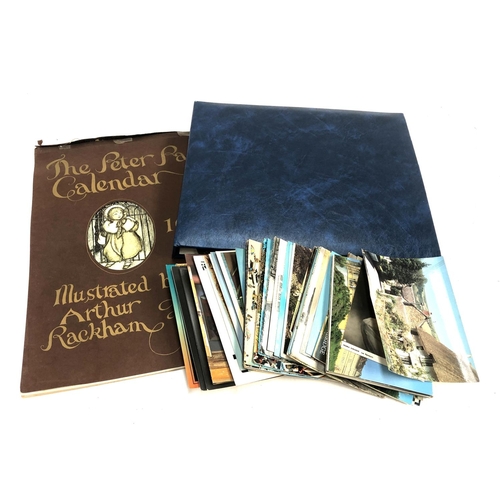 570 - POSTCARDS. A postcard album with some loose cards. Some vintage. And an Arthur Rackham 1977 'Peter P... 