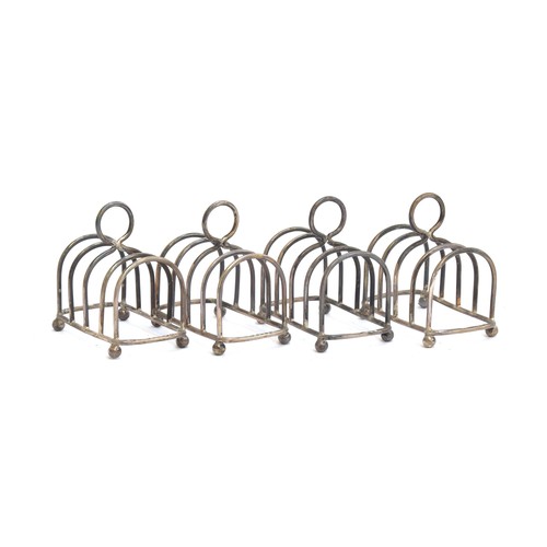 70 - A set of four very small silver four division toast racks, by J B Chatterley & Sons Ltd, Birmingham ... 