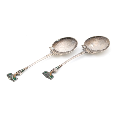 55 - A pair of Arts & Crafts silver and enamel spoons by George Lawrence Connell, London 1903, with plani... 