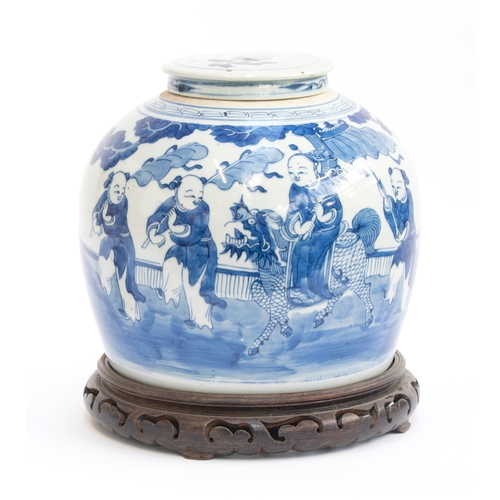 212 - A large Chinese Kangxi style porcelain blue and white ginger jar (cracked), depicting festival scene... 