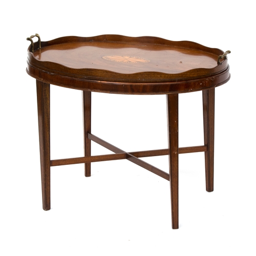 450 - A Georgian style oval galleried tray on stand, with central patera, 71cm wide, 49cm deep, 56cm high
... 