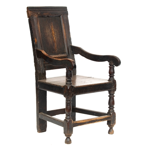 353 - A 17th century oak wainscot chair, the square back with carved stiles and a central scratch carved p... 