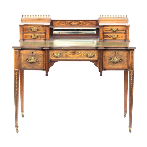 427 - A late 19th century rosewood writing desk by Edwards & Roberts, having two piers, each with hinged l... 