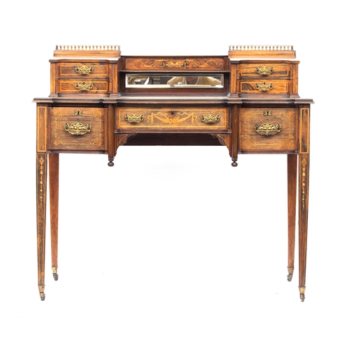 427 - A late 19th century rosewood writing desk by Edwards & Roberts, having two piers, each with hinged l... 