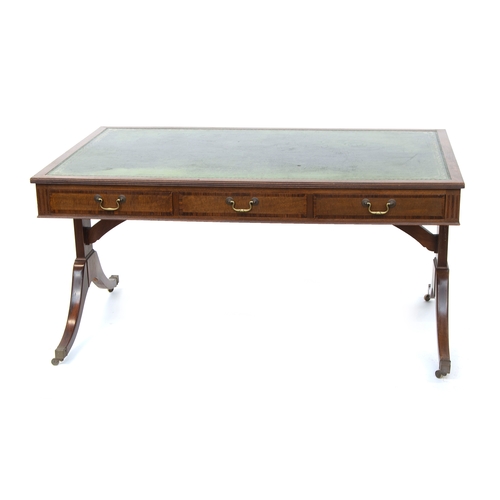 436 - A large early 20th century desk, the gilt tooled green leather skiver over three drawers and three o... 