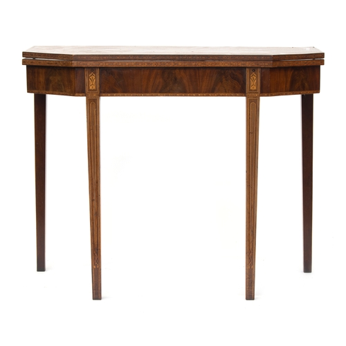 374 - A George III mahogany tea table, c.1790, the foldover top with canted corners, on line inlaid square... 