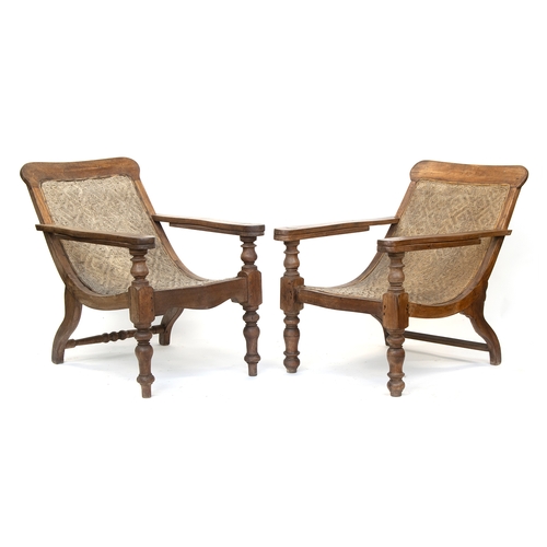 458 - A pair of early 20th century Indian teak planter's chairs, each approx. 64cm wide