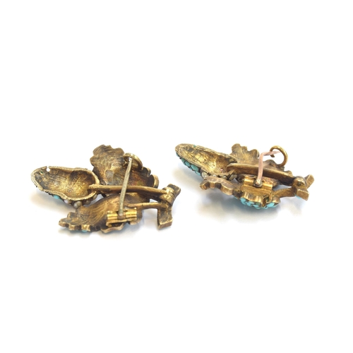 3 - A pair of Victorian silver gilt brooches in the form of acorns set with turquoise cabochons and pear... 