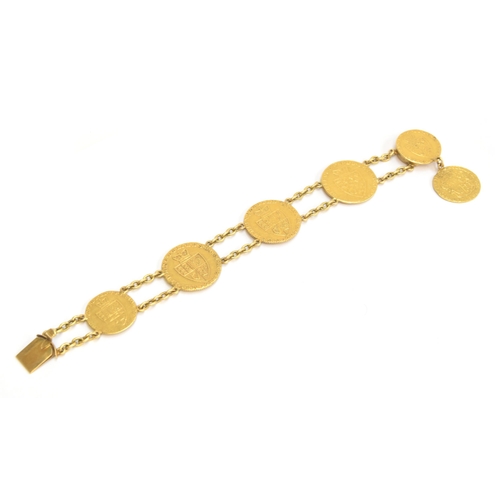 1 - A bracelet formed of George II spade guinea and half guinea gold coins, with a concealed box clasp, ... 