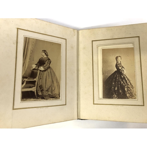 625 - BOOK, VICTORIAN PHOTO ALBUM. A clasped album featuring photographs 'taken from Life' by Mayall of Re... 