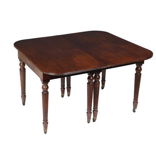 425 - A George IV mahogany extending dining table, c.1825, the draw action with two additional leaf insert... 