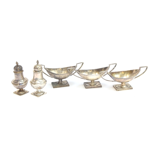 68 - A trio of navette shaped twin handled silver salts by George Nathan & Ridley Hayes, Chester (AF), to... 