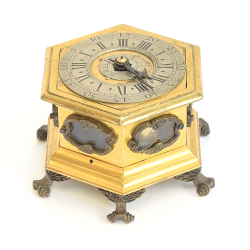 349 - A small 18th century German or Polish hexagonal horizontal striking table clock in the manner of Joh... 