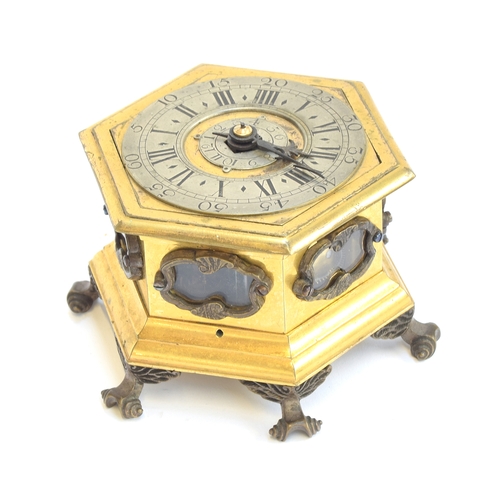 349 - A small 18th century German or Polish hexagonal horizontal striking table clock in the manner of Joh... 