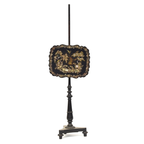 431 - A 19th century ebonised and abalone inlaid pole fire screen, in the manner of Jennens & Bettridge, 1... 