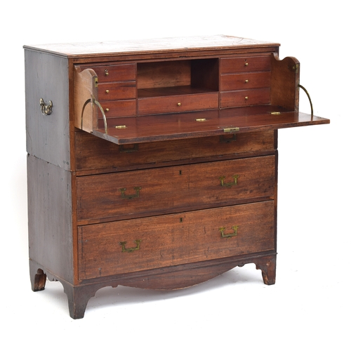 372 - A 19th century teak campaign chest, in two sections, the secretaire drawer over three further gradua... 