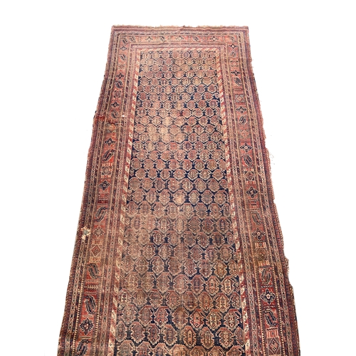 488 - A late 19th century Persian carpet, probably Hamadan, 560x205cm

Provenance: Sir Terence and Lady Co... 