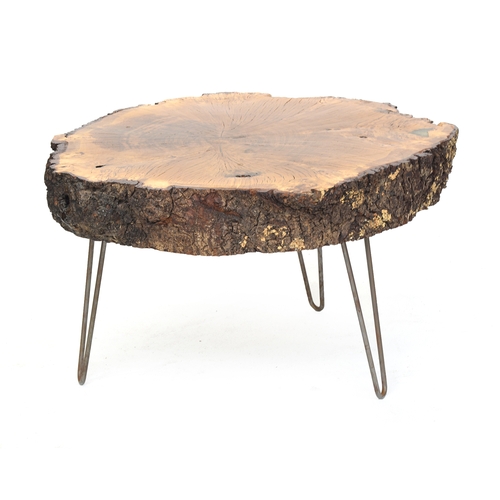 468 - An oak coffee table, with living edge, on fabricated metal base, the top approx 95cm by 85cm, 55cm h... 