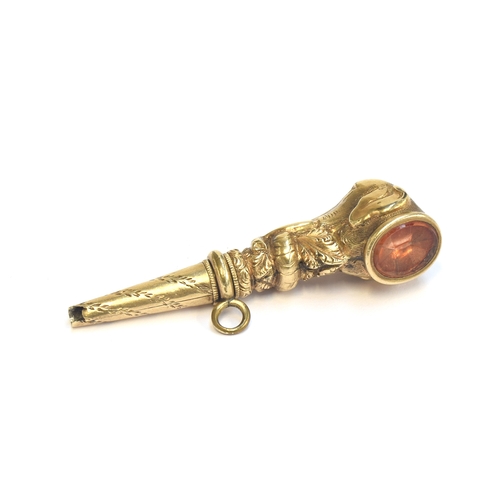 26 - A Victorian yellow metal watch key in the form of an elephant head, foiled citrine matrix, 4.7cm lon... 