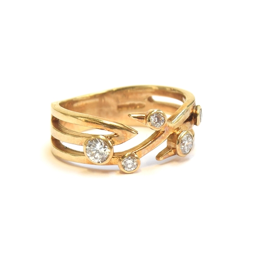 34 - A contemporary 9ct gold and diamond ring, with five bezel set diamonds, size M, 3.7g