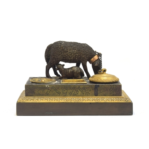 121 - A mid 19th century French bronze and ormolu ink stand, surmounted with figure of a sheep and lamb, e... 