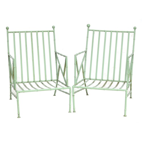 473 - A set of six sage green painted wrought iron faux bamboo garden open armchairs, with cushions, 60cm ... 