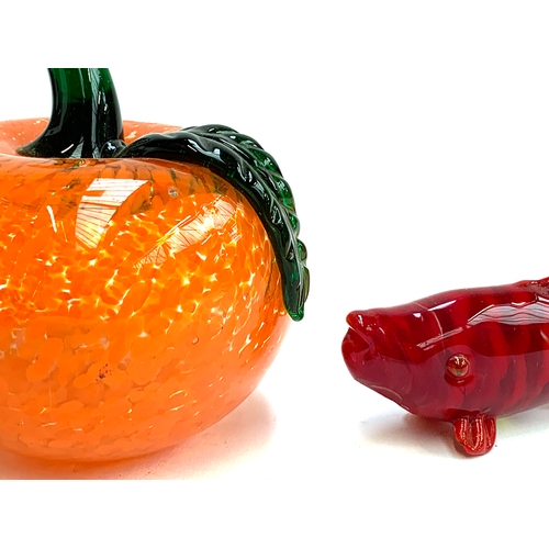 237 - An art glass orange fruit, 11.5cmH; together with a red glass fish (2)