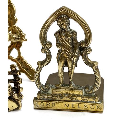 386 - Two brass urn form door knockers; a small late 19th century brass Lord Nelson book end, with Rd. Num... 