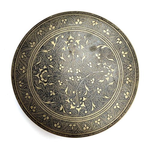 335 - A round late 19th/early 20th century Indian black enamelled box, 11.5cmD