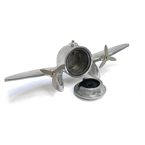 404 - An aluminium novelty prop plane vintage desk clock, 35cm wide