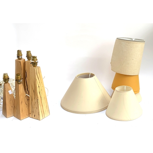 496 - A set of five wooden spalted beech table lamps, 30cmH and 20cmH; together with a number of shades