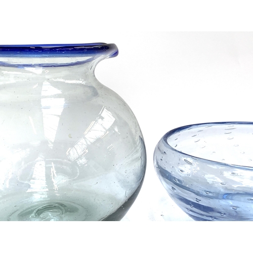 266 - A large handblown glass jug with blue rim and handle, 18.5cmH; together with a vintage blue bubble g... 